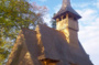 Visite de l'église en bois